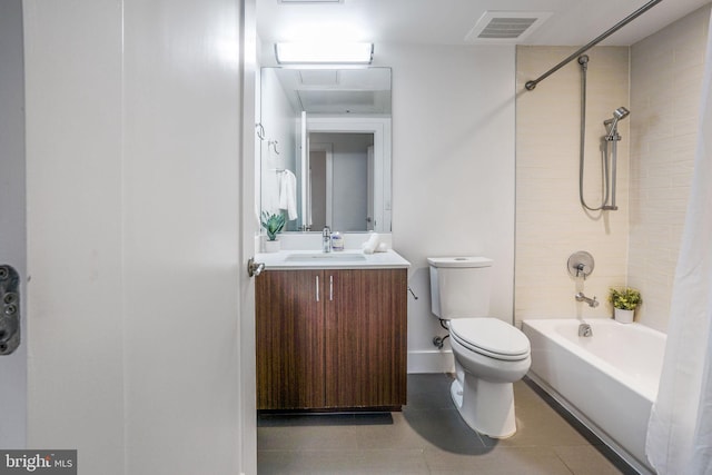 full bathroom featuring shower / bathtub combination, large vanity, tile floors, and toilet