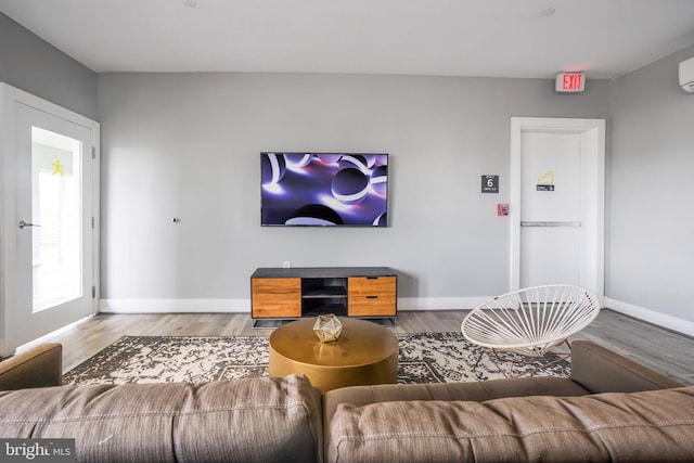 living room with wood-type flooring