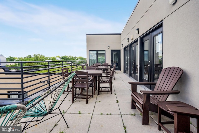 view of patio / terrace with a balcony