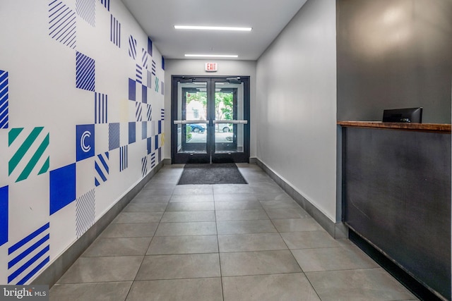 interior space featuring dark tile floors and french doors