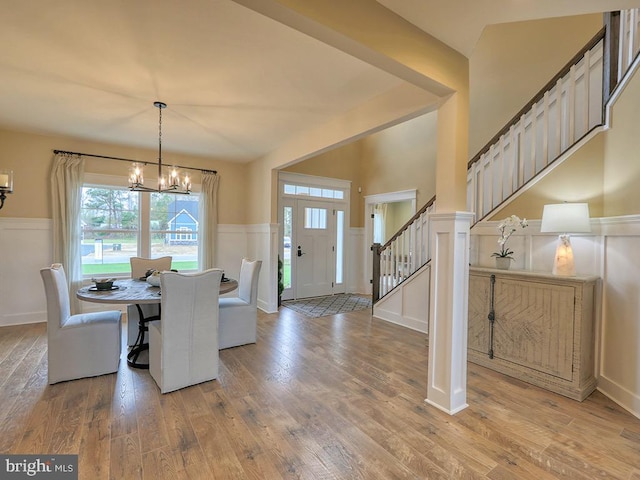 dining room with a chandelier and wood-type flooring