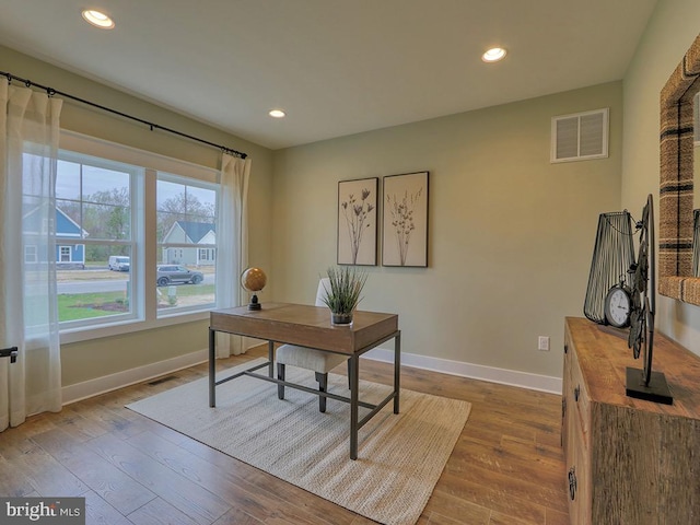 office space featuring hardwood / wood-style floors