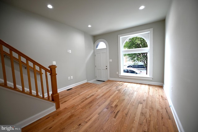 entrance foyer with light wood-type flooring