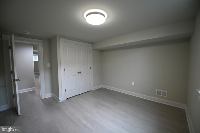 unfurnished bedroom featuring light hardwood / wood-style flooring