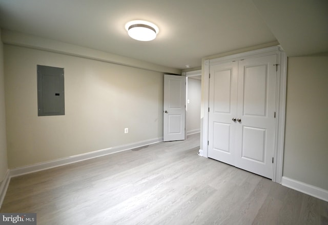 unfurnished bedroom featuring light wood-type flooring