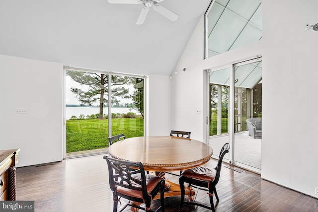 dining space with dark hardwood / wood-style floors, plenty of natural light, and ceiling fan