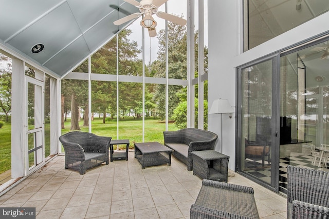 sunroom featuring a wealth of natural light and ceiling fan