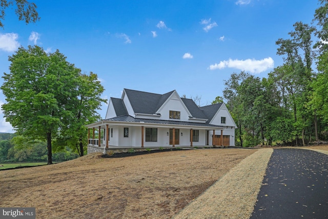 view of front of house with covered porch