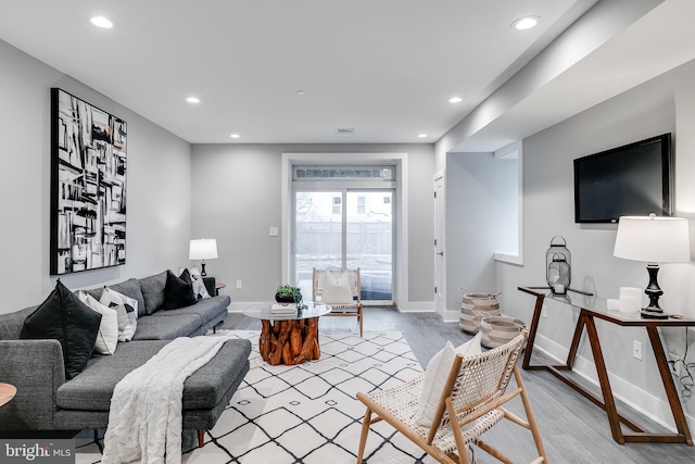 living room featuring light hardwood / wood-style floors