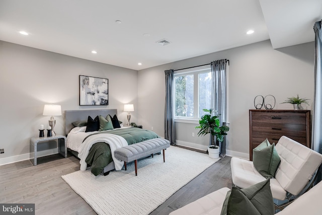 bedroom with light wood-type flooring