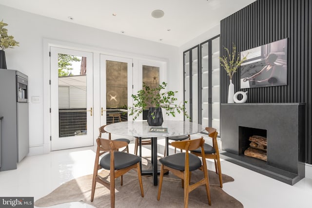 tiled dining room with french doors