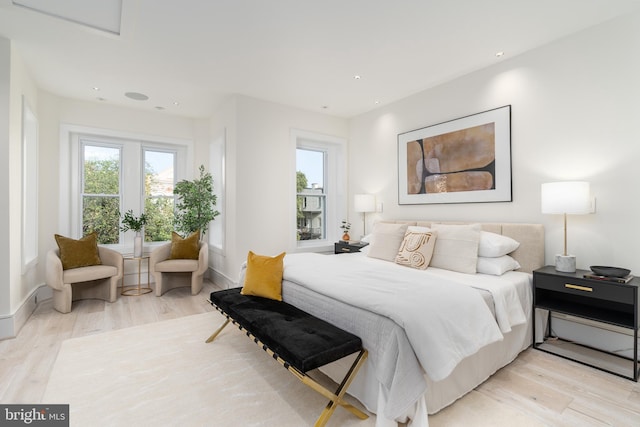 bedroom with light wood-type flooring