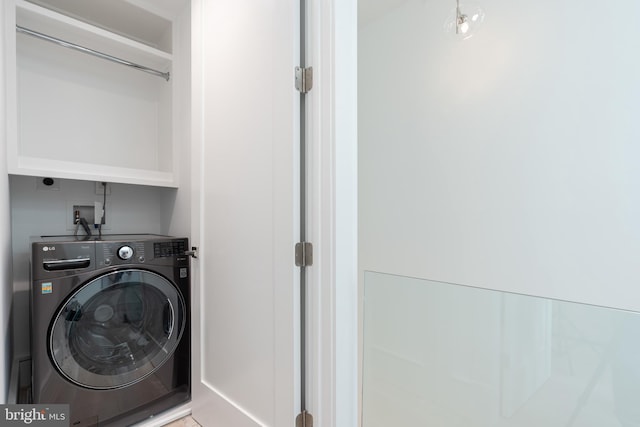 washroom featuring washer / clothes dryer