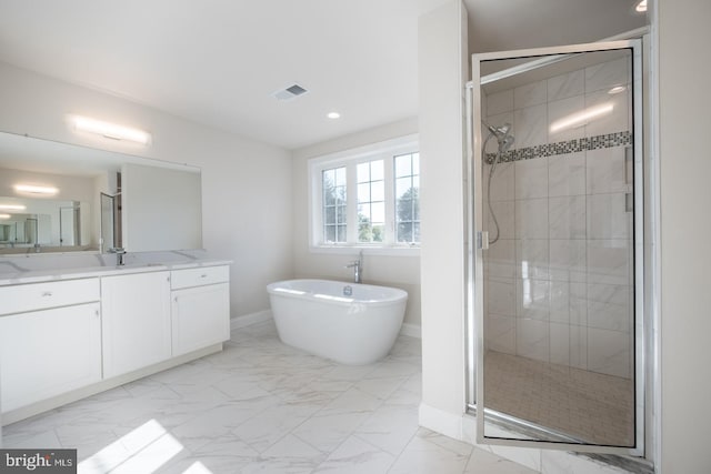 bathroom with independent shower and bath, vanity, and tile flooring