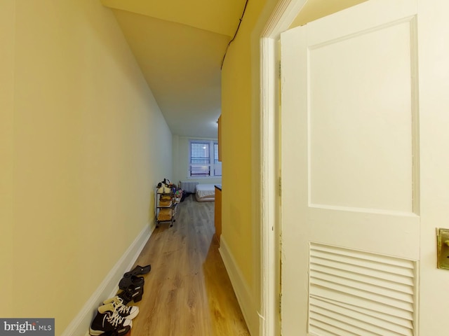 corridor featuring hardwood / wood-style flooring