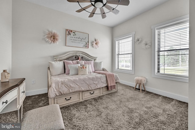 carpeted bedroom featuring ceiling fan