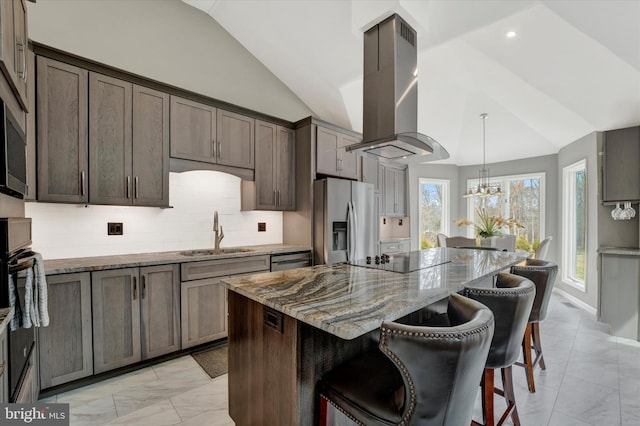 kitchen featuring marble finish floor, island exhaust hood, black appliances, and a sink