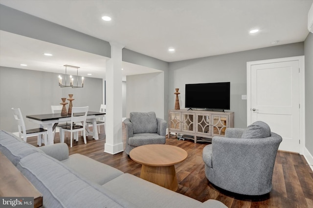 living area featuring dark wood-style floors and recessed lighting
