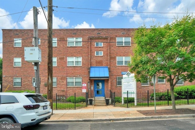 view of building exterior with central air condition unit