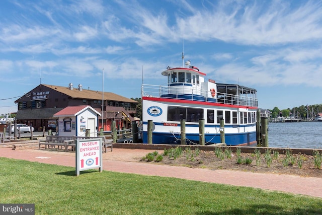 view of building exterior with a water view