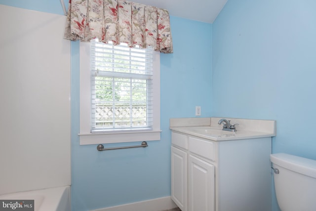 full bathroom featuring toilet, vanity, and shower / bath combination