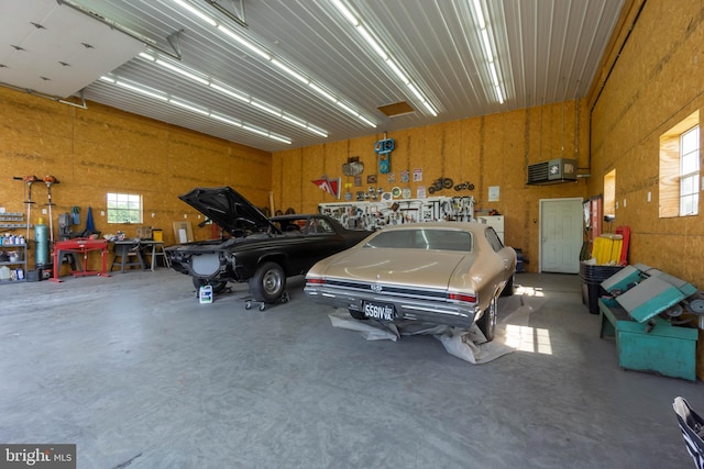 garage with a workshop area