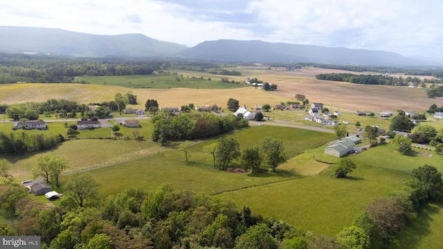 aerial view featuring a rural view and a mountain view