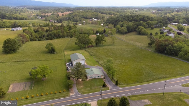 birds eye view of property featuring a rural view