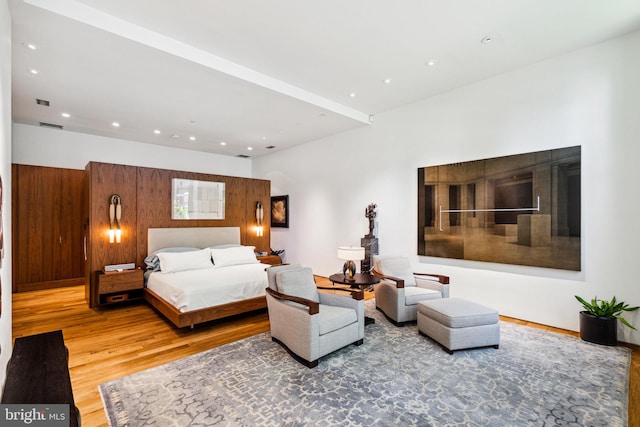 bedroom with light hardwood / wood-style flooring