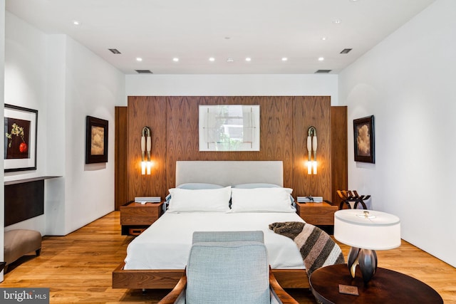 bedroom with light hardwood / wood-style flooring