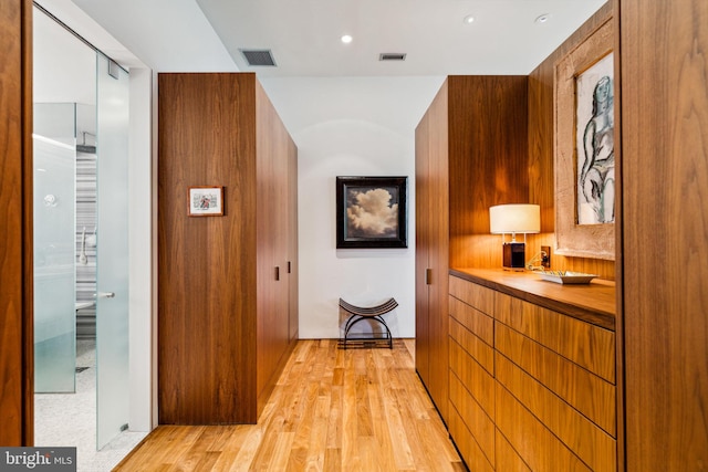 corridor featuring light hardwood / wood-style flooring