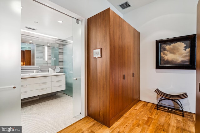 bathroom featuring vanity and tile flooring