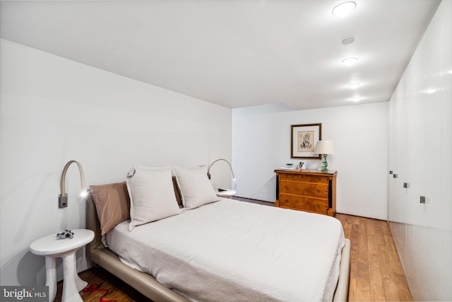 bedroom featuring light wood-type flooring