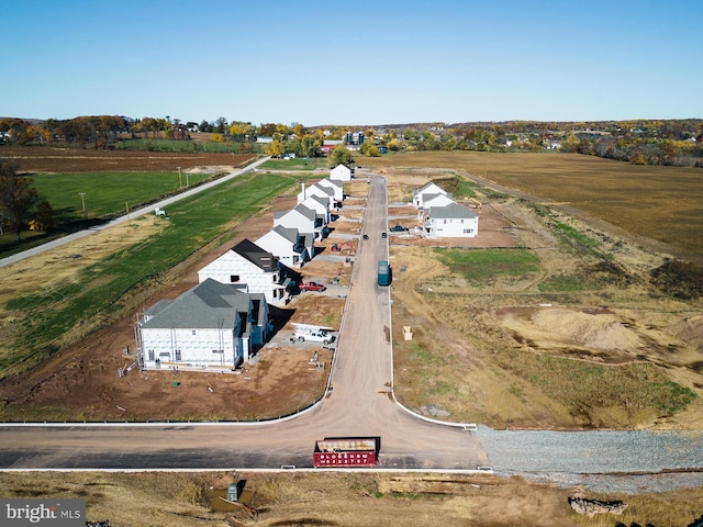 birds eye view of property featuring a rural view