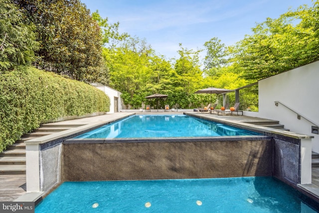 view of pool with a patio area