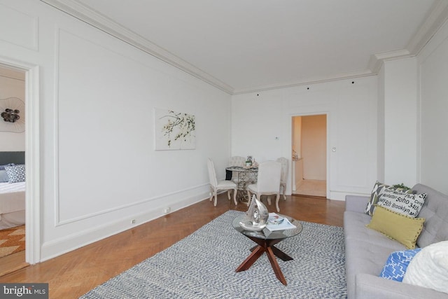 living room featuring dark parquet floors and ornamental molding