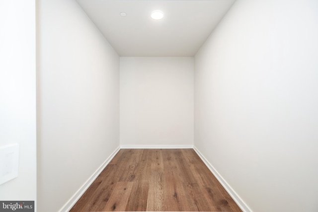 empty room featuring dark wood-type flooring