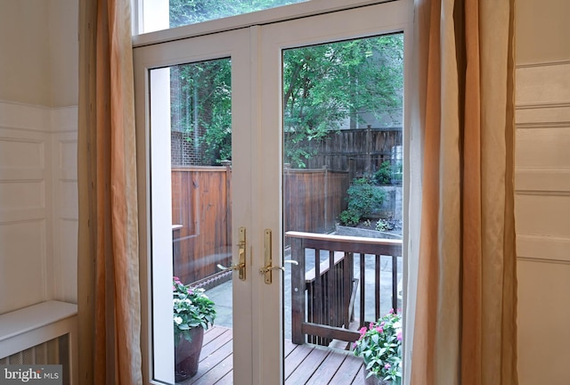 doorway featuring french doors and wood-type flooring