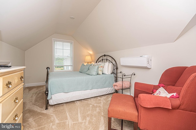 bedroom featuring vaulted ceiling and light colored carpet