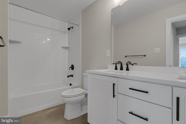 full bathroom featuring tile patterned floors, vanity,  shower combination, and toilet