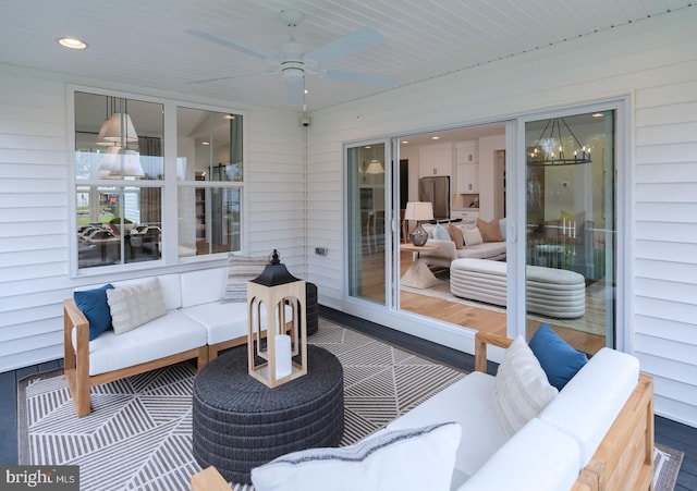 view of patio / terrace with an outdoor living space and ceiling fan