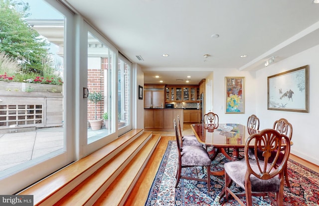 dining area with light wood-type flooring