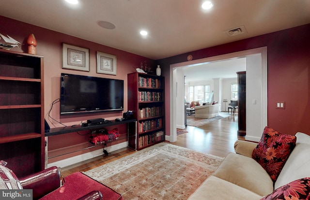 living room with light hardwood / wood-style floors