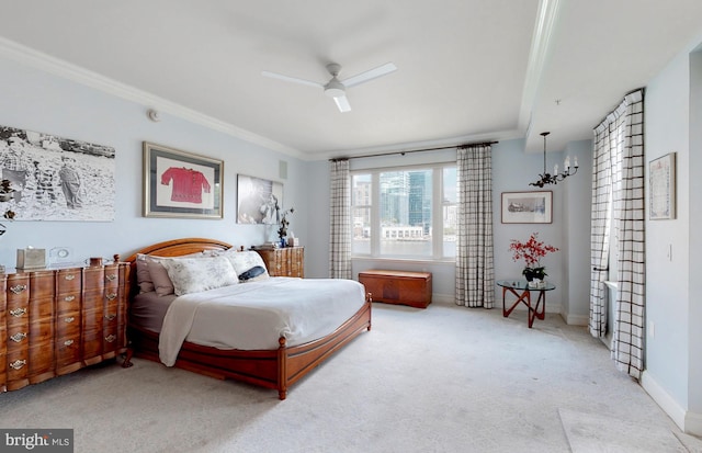 bedroom featuring light colored carpet, ceiling fan, and ornamental molding