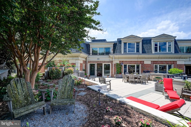 rear view of house featuring a patio area