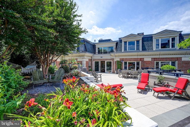 rear view of house featuring a patio