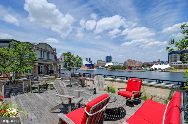 deck featuring a water view