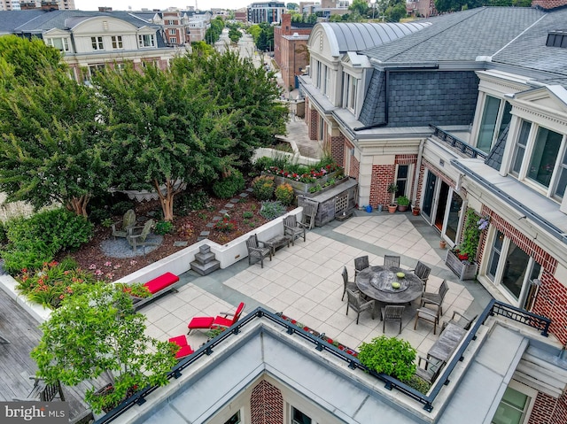 exterior space featuring an outdoor fire pit