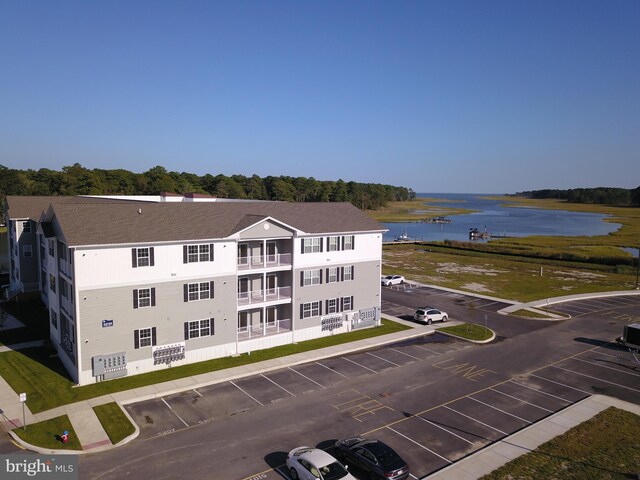 drone / aerial view with a water view