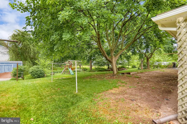 view of yard with a playground